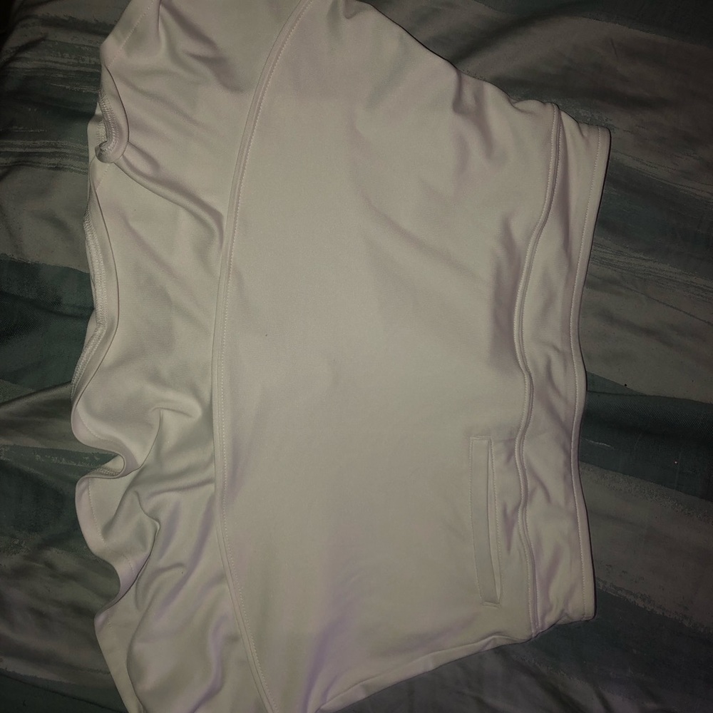 A white Slazenger golf skirt, have not been used